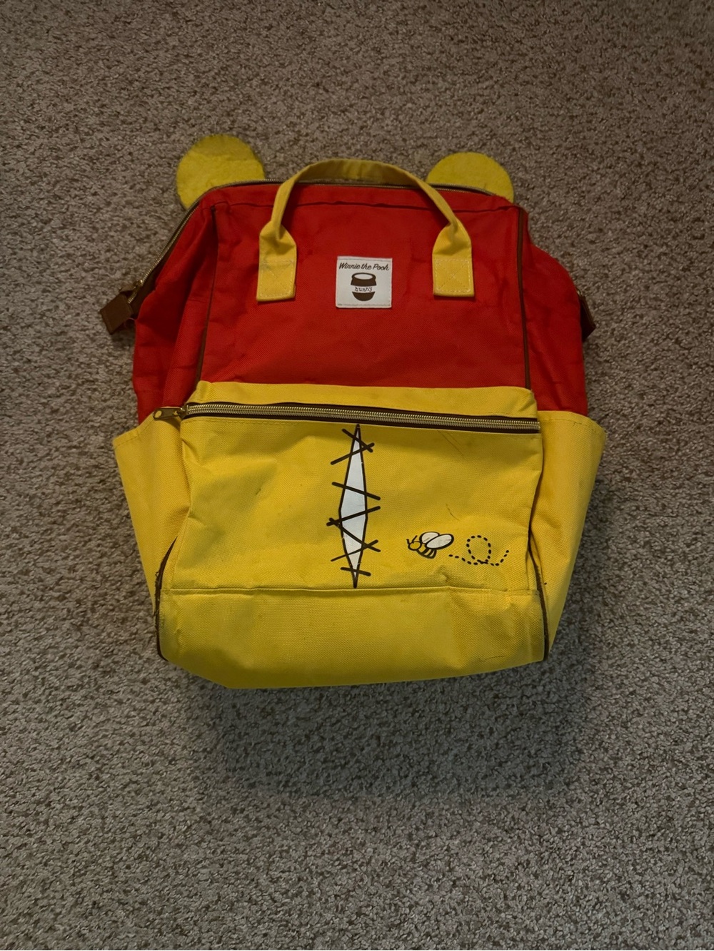 Disney Red and Yellow Winnie the Pooh Backpack
